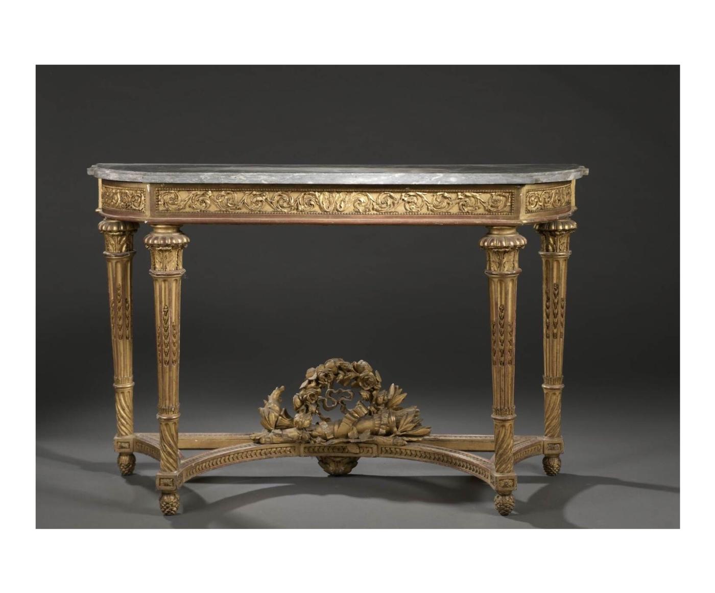 Console en chêne mouluré, sculpté et redoré d'époque Louis XVI provenant du château de Grignon.
Lot adjugé 13 000 euros chez Daguerre le 8 novembre 2022.