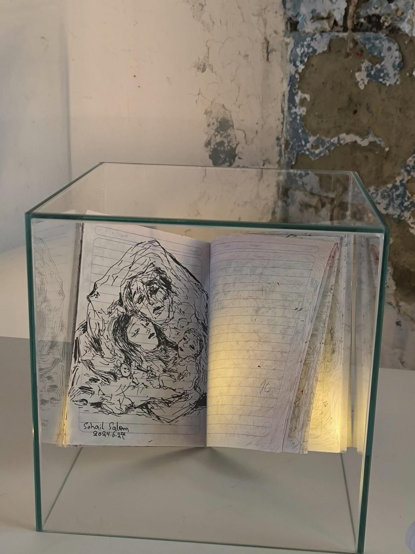 Le carnet de dessins de Suhail Salem dans l’exposition « Upon the Ruins of the World » par la biennale de Gaza-Jinnaah UK à Ugly Duck Londres.
